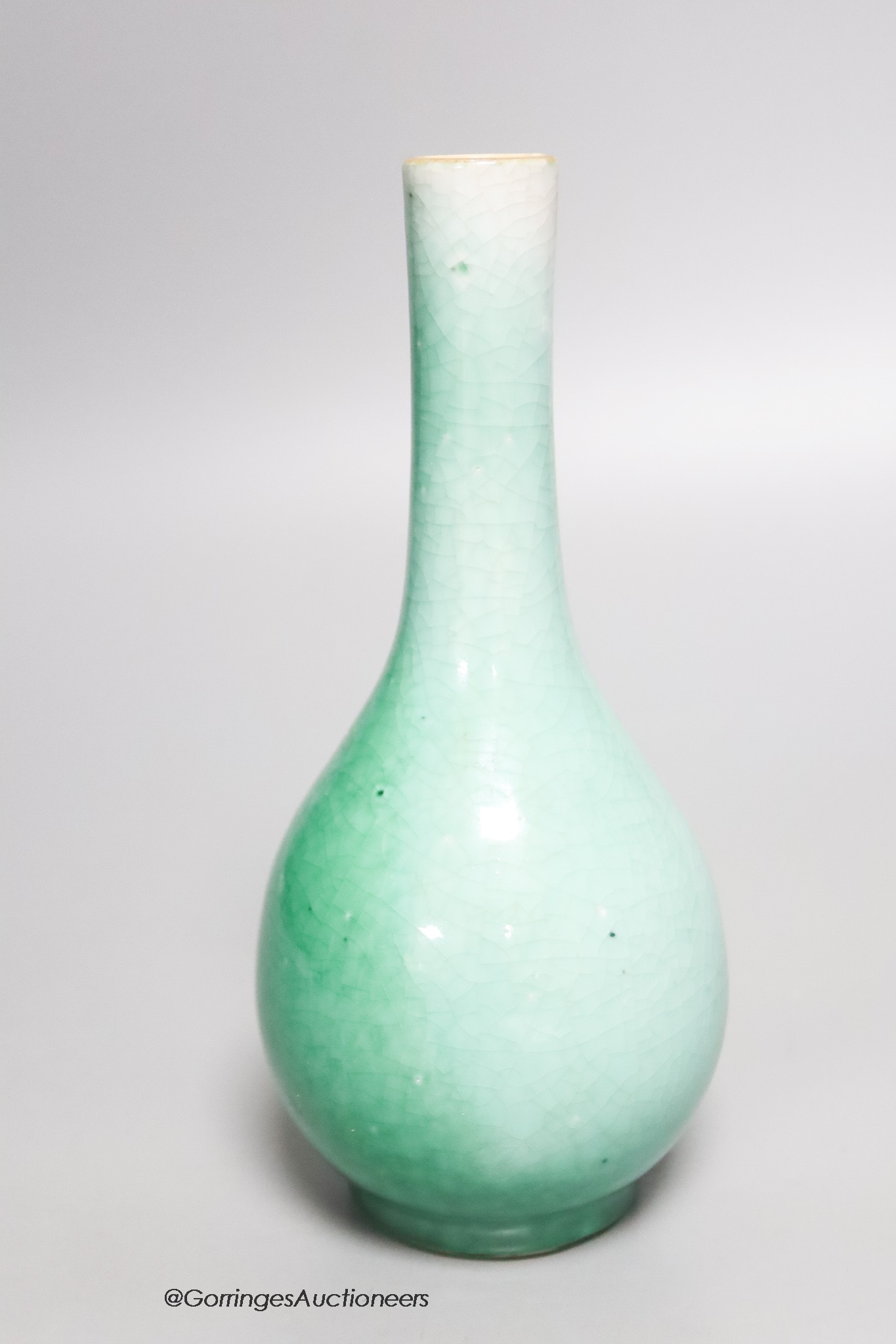 A Chinese green crackle glazed bottle vase, height 19cm